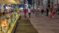 People walking in the Old city center of Vienna in Stephansplatz night timelapse