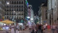 People walking in the Old city center of Vienna in Stephansplatz night timelapse