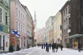 People are walking in old town in Tallinn.