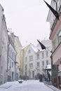 People are walking in old town in Tallinn.