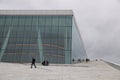 People walking on Oslo Opera House Royalty Free Stock Photo