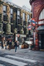 People walking outside Covent Garden station in London, UK Royalty Free Stock Photo