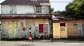 People walking outside, Creole architecture, Mana, French Guiana