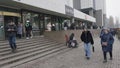 People walking outside ZUM Aichurok mall in Bishkek