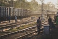 People walking over tracks in india Royalty Free Stock Photo