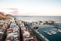 People walking on the Paseo Maritimo in the touristic city of Alicante in Spain in 2022 Royalty Free Stock Photo