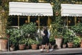 People walking past Gloria, Italian restaurant in Shoreditch, London, UK Royalty Free Stock Photo