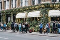 People walking past Gloria, Italian restaurant in Shoreditch, London, UK Royalty Free Stock Photo