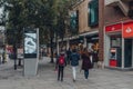 People walking past Whole Foods on Lower George Street in Richmond, London, UK Royalty Free Stock Photo