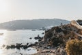 People walking on the path over the hill between Hidden and Platis Yialos beaches, Mykonos, Greece Royalty Free Stock Photo