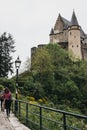 People walking on the path towards Vianden Castle, Luxembourg Royalty Free Stock Photo