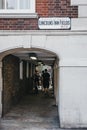 People walking through the pedestrian tunnel on Lincoln`s Inn Field, London, UK.