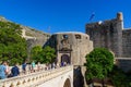 People walking through Pile Gate, the main entrance to the old town of Dubrovnik, Croatia Royalty Free Stock Photo