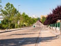 People walking and playing sports on a closed road for the exclusive use of pedestrian use during the coronavirus alarm state