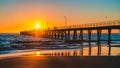 People walking on Port Noarlunga jetty at sunset Royalty Free Stock Photo