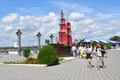 Anapa, Russia, July, 18, 2018. People walking on the promenade next to the sailboat `Scarlet sails` on Anapa resort in sunny day