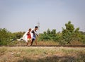 People walking on rail track in Mandalay, Myanmar