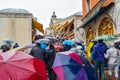 People walking on rainy day with umbrellas on staircase of Rialto Bridge Ponte de Rialto in Venice, Italy Royalty Free Stock Photo