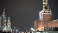 People walking at Red Square Kremlin Moscow city Russia. With Kremlin Chiming clock audio. 7 p.m.