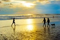 People walking running beach. Bali Royalty Free Stock Photo