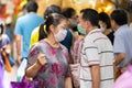 People walking shopping for Chinese food resource in Chinatown Yaowarach market and waring face mask for protect CoronavirusCovid Royalty Free Stock Photo
