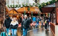 London, UK/Europe; 20/12/2019: People walking and shopping in the Christmas market of Leicester Square, London