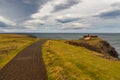 People walking on the south coast of the Snaefellsnes peninsula, Iceland