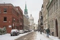 People walking on St-Paul street in Old Montreal, with Bonsecours Market in background Royalty Free Stock Photo