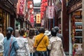 People walking in street of Fang Bang Zhong Lu old city shanghai