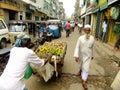 People walking on a street of Pettah neighborhood, Colombo, Sri