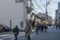 People are walking on street toward Shitennoji in Osaka Tennoji area