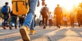 People walking on sunlit street with backpacks, creating vibrant urban scene