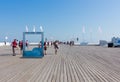 People walking along the Sopot Pier Molo, the longest wooden pier in Europe, Poland.