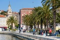 People walking on a sunny summer day on Riva street in Split, Croatia