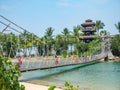 People Walking on the Suspension Bridge at Palawan Beach Singapore Royalty Free Stock Photo