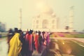 People Walking Through the Taj Mahal Famous Place Concept