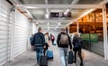 People walking on the temporary path inside the Aeroport