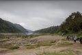 People walking to the river for a boat ride