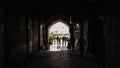 people are walking to their work in the morning, naghshe jahan square, isfahan city, iran