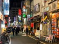 People walking in Tokyo Alley at Night Royalty Free Stock Photo