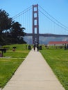 People walking towards the Golden Gate