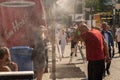 People walking under misting system to cool off during heatwave