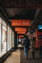 People walking under sale signs on House of Fraser Oxford Street store, London, UK Royalty Free Stock Photo