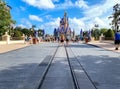 People walking up to Cinderella`s Castle in the Magic Kingdom at  Walt Disney World Resorts in Orlando, FL Royalty Free Stock Photo