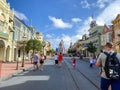 People walking up to Cinderella`s Castle in the Magic Kingdom at  Walt Disney World Resorts in Orlando, FL Royalty Free Stock Photo