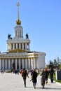 People walking at VDNKH park in Moscow.