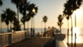 People walking, wooden pier in California USA. Oceanside waterfront vacations tourist resort. Royalty Free Stock Photo