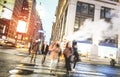 People walking on zebra crossing on West 31th st in Manhattan - New York City Royalty Free Stock Photo