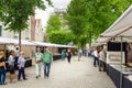 People Wandering around an Art Market in Amsterdam