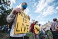 People with We want to live banners at Extinction Rebellion Protest at Parliament square